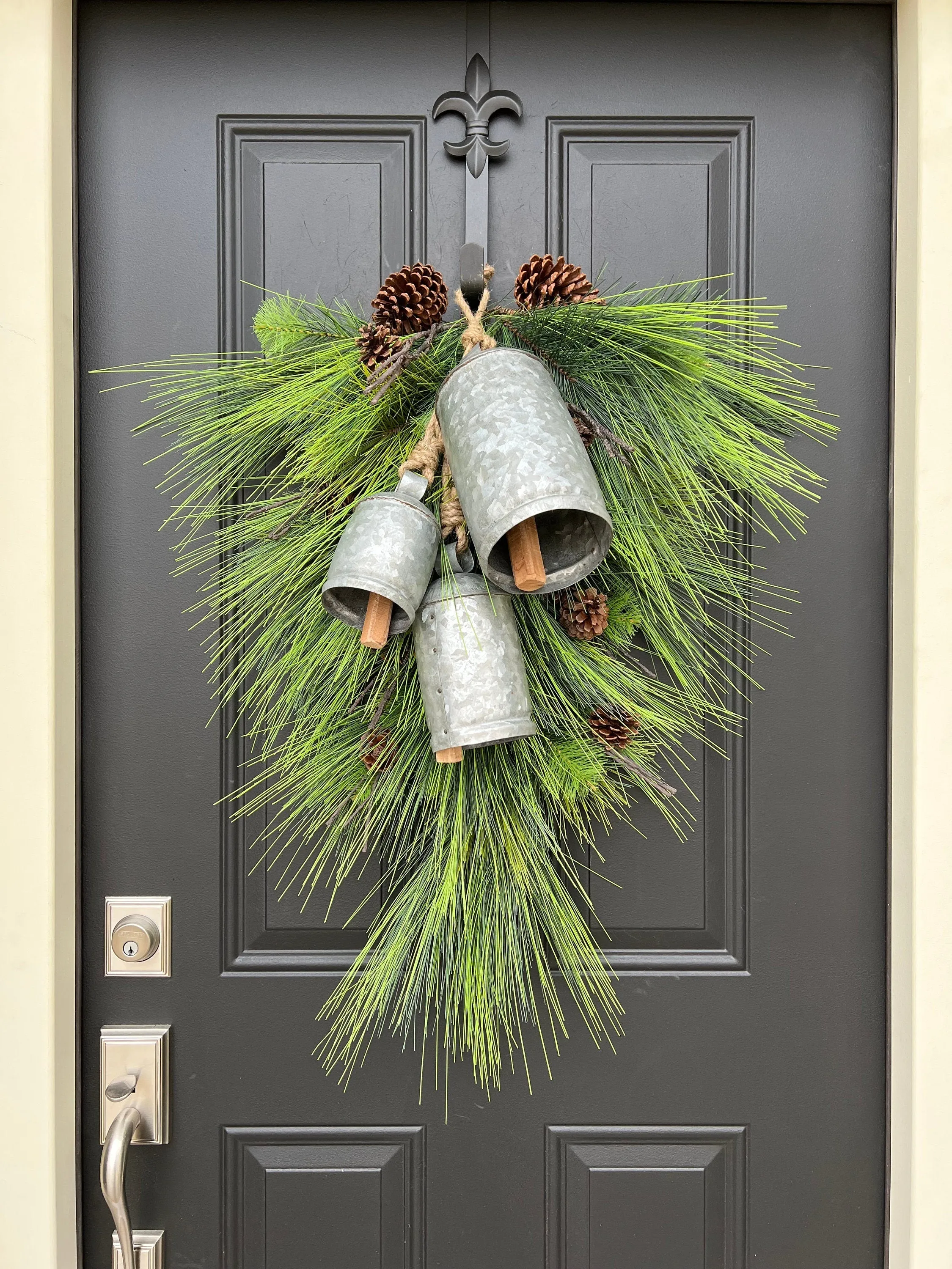 Winter Pine Teardrop Swag with Decorative Bells and Pinecones
