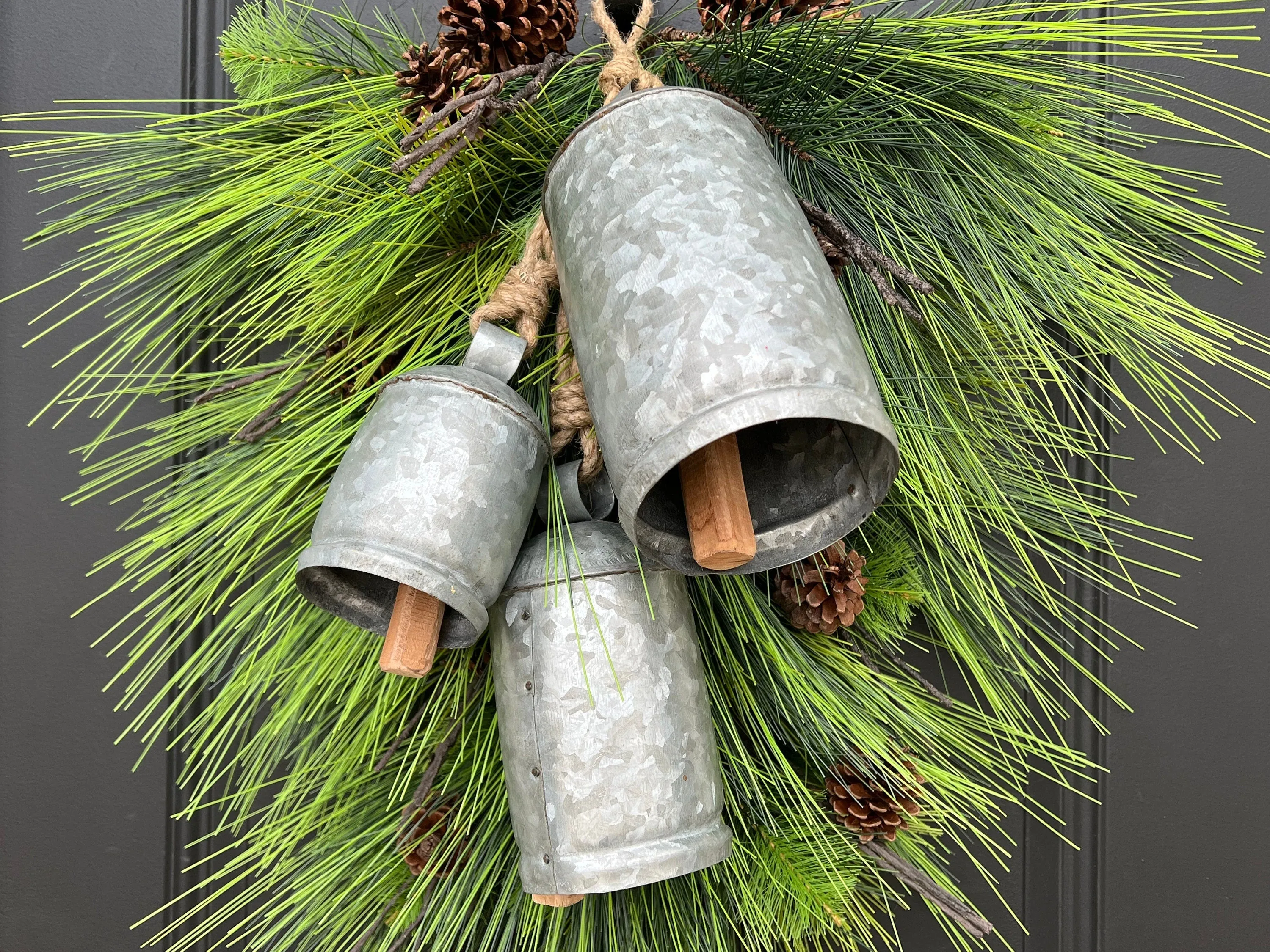 Winter Pine Teardrop Swag with Decorative Bells and Pinecones