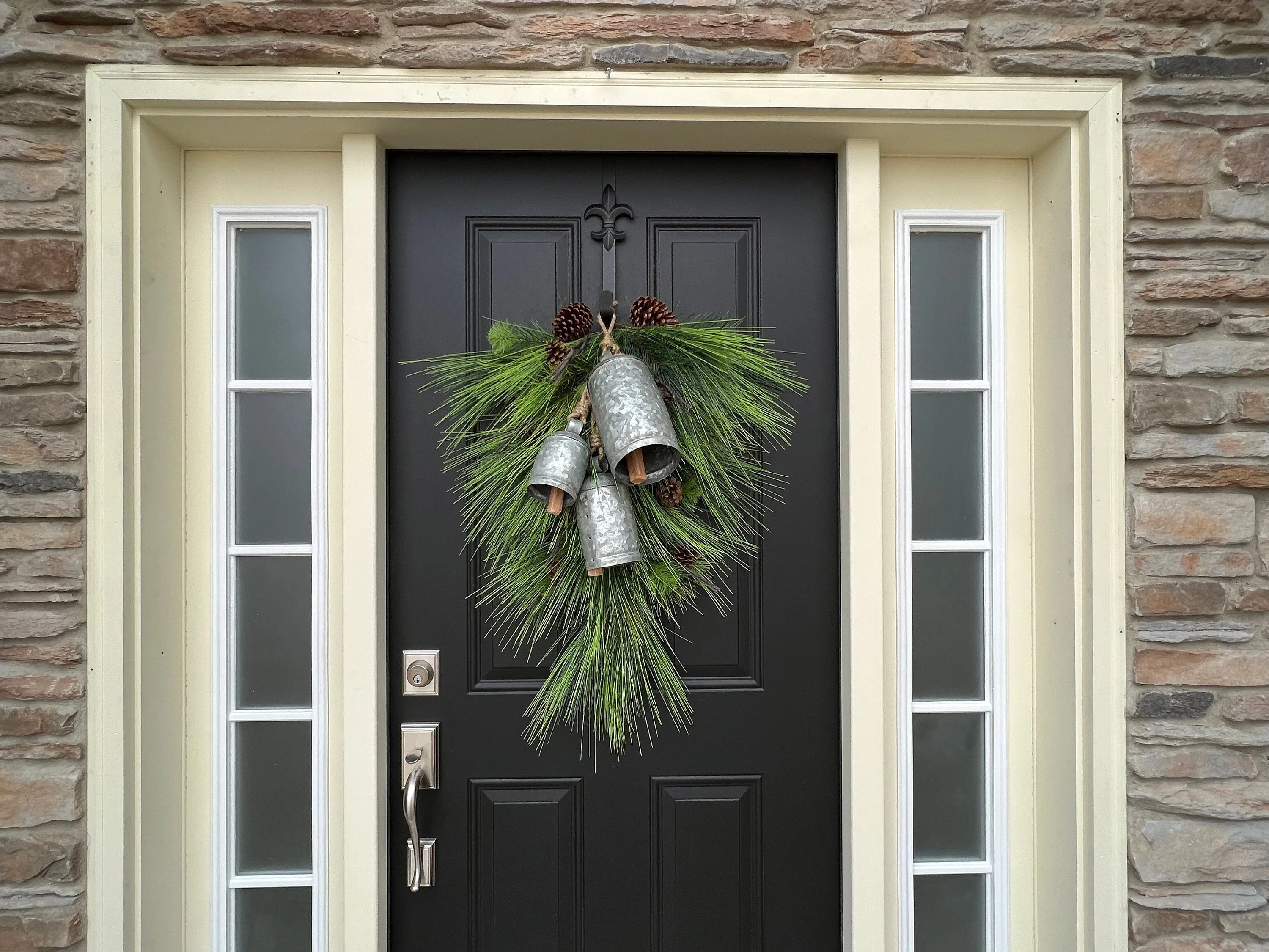 Winter Pine Teardrop Swag with Decorative Bells and Pinecones