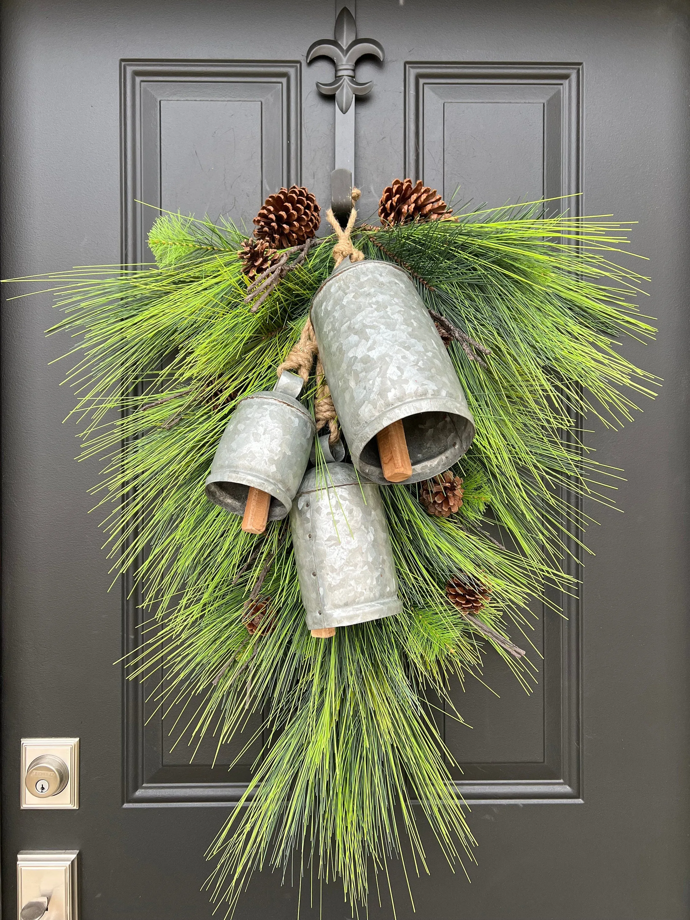 Winter Pine Teardrop Swag with Decorative Bells and Pinecones
